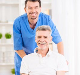 male caregiver and old man