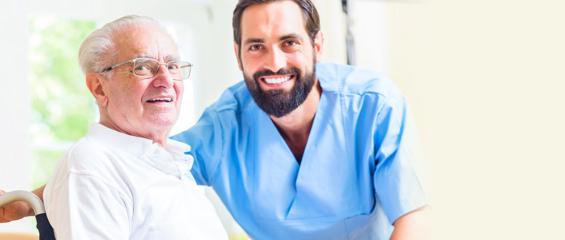 male caregiver and old man