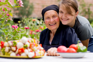 lady and elder woman smiling